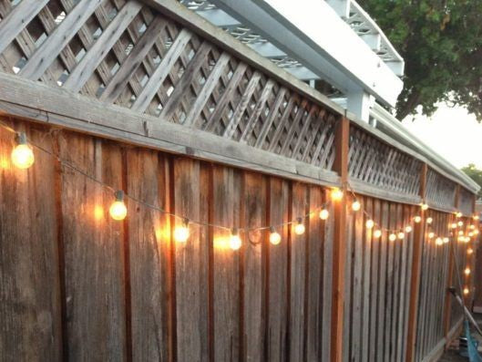 string lights on fence