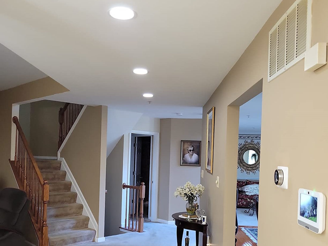 Tips for installing recessed lighting in sloped ceilings?